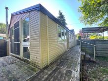 Attraktives Chalet auf dem Campingplatz Heideruh in Uelsen/Getelo Haus kaufen 49843 Uelsen Bild klein