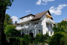 Attraktives gepflegtes 7-Parteienhaus in Darmstadt – Siedlung Tann Haus kaufen 64295 Darmstadt Bild klein