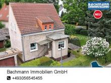 Berlin / Kaulsdorf: Sanierungsbedürftiges Einfamilienhaus mit 4 Zimmern auf einem gr. Grundstück Haus kaufen 12621 Berlin Bild klein
