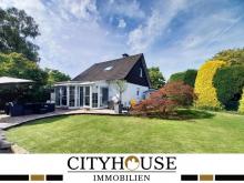 CITYHOUSE: Freistehendes Einfamilienhaus mit Traumgarten, Wintergarten, Kamin, Sauna und Garage Haus kaufen 51491 Overath Bild klein