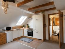 Dachgeschosswohnung mit EBK und PKW-Stellplatz in Feldrandlage! Wohnung mieten 26409 Wittmund Bild klein
