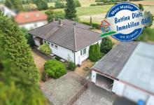 DIETZ: Gepflegter Bungalow in direkter Feldrandlage mit Keller, Garage und viel Platz in Ringheim! Haus kaufen 63762 Großostheim Bild klein