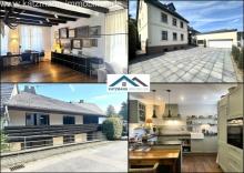 Doppelte Chance: Zwei Gebäude mit Wohnhaus, Ferienwohnung, Arztpraxis und Doppelgarage Haus kaufen 53947 Nettersheim Bild klein