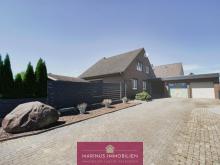 Einfamilienhaus mit Vollkeller, Doppelgarage und großem Grundstück in Tarmstedt Haus kaufen 27412 Tarmstedt Bild klein