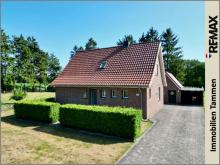 + Einmalige Alleinlage nahe Papenburg – gepflegtes Einfamilienhaus auf 1.839 m² Grundstück + Haus kaufen 26810 Westoverledingen Bild klein