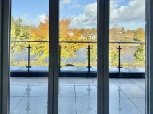 Exklusive Dachgeschosswohnung mit Balkon und Kanalblick – modernes Wohnen in Westerrönfeld Wohnung mieten 24784 Westerrönfeld Bild klein