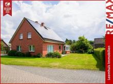 Familienfreundliches Wohnen in ruhiger Lage – Modernes Einfamilienhaus mit viel Platz und Komfort! Haus kaufen 26826 Weener Bild klein
