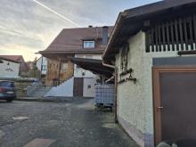 Freistehendes Einfamilienhaus mit abgeschlossenen 650qm großem Grundstück im Ortskern Haus kaufen 97711 Maßbach Bild klein