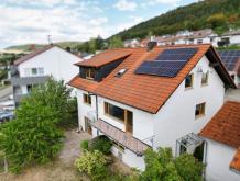 Freistehendes Einfamilienhaus von 1992 mit Einliegerwohnung, Westgarten, Garage und PV-Anlage Haus kaufen 72393 Burladingen Bild klein