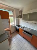Gemütliche und vermietete DG 2-Zimmer mit Laminat und EBK in guter Lage Wohnung kaufen 09130 Chemnitz Bild klein