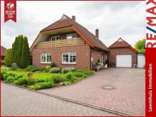 Gepflegtes Einfamilienhaus mit parkähnlichem Garten in bester Lage von Bunde! Haus kaufen 26831 Bunde Bild klein