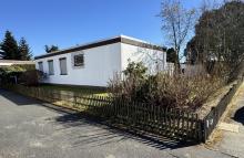 großzügiger Bungalow in ruhiger Lage mit Grundstück Haus kaufen 30826 Garbsen Bild klein