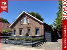 *Großzügiges Grundstück * gepflegter Garten * saniert * 2 Carports * Terrassen * Fassadenerneuerung* Haus kaufen 26826 Weener Bild klein
