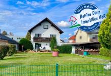 Großzügiges Zweifamilienhaus mit sonnigem Garten, Terrasse und Garage in idyllischer Feldrandlage Haus kaufen 64850 Schaafheim Bild klein