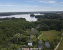 Idylle pur: Kleines Ferienhaus am See nahe HH & Berlin an der Mecklenburger Seenplatte Haus kaufen 17252 Schwarz (Landkreis Mecklenburgische Seenplatte) Bild klein