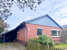 Ihr Haus in Lohe-Rickelshof: ebenerdiger Satteldach-Bungalow mit Einliegerwhg. in ruhiger Lage Haus kaufen 25746 Lohe-Rickelshof Bild klein