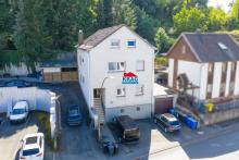 ++ KRAG Immobilien ++ Solides Anlageobjekt mit Garage und Teilkeller | vermietet | provisionsfrei Haus kaufen 35075 Gladenbach Bild klein