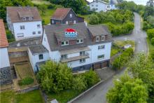 ++ KRAG Immobilien ++ Viel Raum auf drei Etagen | drei Einheiten | Balkone, Terrasse, Garagen Haus kaufen 35080 Bad Endbach Bild klein