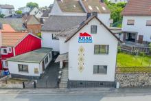 ++ KRAG Immobilien ++ Wohnen und Arbeiten auf einem Grundstück mit Büro und Garage Haus kaufen 35232 Dautphetal Bild klein