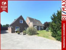 MEGA-Preis * MFH mit 5 Wohneinheiten * 14km von der NORDSEE entfernt * TOP-Rendite von 9% möglich * 
großer Wintergarten * über 3.100qm Grundstück * Grundstückswert ca. 235.000.-Euro * zentrale Lage * Haus kaufen 26524 Berumbur Bild klein