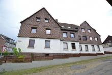 Mehrfamilienhaus mit 7 WE, Werkstattgebäude und 3 Garagen Haus kaufen 37632 Eschershausen Bild klein