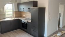 NEUBAU – Bezugsfertige Dachgeschosswohnung mit Photovoltaikanlage, Lüftungsanlage, Carport! Wohnung kaufen 26506 Norden Bild klein