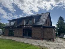 NEUBAU – Bezugsfertige Erdgeschosswohnung mit Photovoltaikanlage, Lüftungsanlage, Carport! Wohnung kaufen 26506 Norden Bild klein