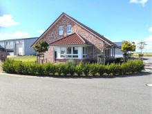 Neues Einfamilienhaus mit moderner, großer Halle für Hobby und Beruf Haus kaufen 25870 Oldenswort Bild klein