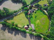 Resthof in Nordhorn-Bimolten – 2 Wohneinheiten, Stallungen, 1,75 ha Haus kaufen 48527 Nordhorn Bild klein