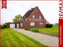 Sehr gepflegtes Einfamilienhaus mit großem Grundstück, Kamin & unverbaubarem Blick ins Grüne! Haus kaufen 26831 Bunde Bild klein