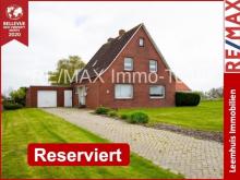 Sehr gepflegtes Einfamilienhaus mit großem Grundstück, Kamin & unverbaubarem Blick ins Grüne! Haus kaufen 26831 Bunde Bild klein