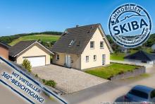 Solides Wohnhaus aus 2005 mit Doppelgarage und Blick ins Grüne in Herresbach, Nähe Nürburgring Haus kaufen 56729 Herresbach Bild klein
