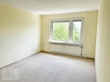 ***WOHNUNG & GARAGE - IHR NEUES PROJEKT MIT WEITBLICK*** Gemütliche Eigentumswohnung mit viel Potenzial und eigener Garage Wohnung kaufen 01619 Zeithain Bild klein