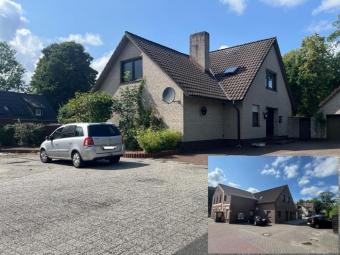 2 Häuser (8 Wohnungen), Doppelgarage und 12 PKW-Stellplätze - Rendite! Haus kaufen 26607 Aurich Bild mittel