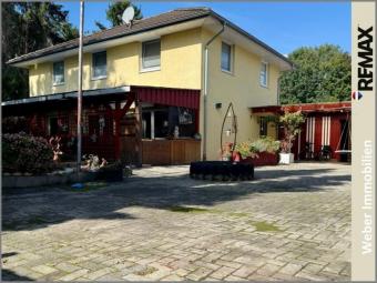 * 6 Schlafzimmer * Gasheizung von 2023 * großer Innenhof * großes Grundstück * überdachte Terrasse Haus kaufen 26683 Saterland Bild mittel