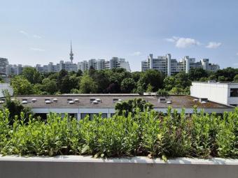 **Alles außer gewöhnlich: Maisonettewohnung im Olydorf - ruhig und familienfreundlich!** Wohnung kaufen 80809 München Bild mittel