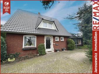 * Attraktives Einfamilienhaus in gefragter Lage – Ruhe trifft Zentralität * Haus kaufen 26831 Bunde Bild mittel