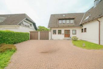 Breitscheid: Einfamilienhaus mit Garten und 2 Garagen Haus 40885 Ratingen Bild mittel