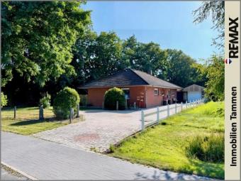 * Bungalow mit seltenem 1.667 m² Grundstück und wunderschönem Baumbestand * Haus kaufen 26810 Westoverledingen Bild mittel