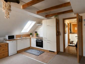 Dachgeschosswohnung mit EBK und PKW-Stellplatz in Feldrandlage! Wohnung mieten 26409 Wittmund Bild mittel