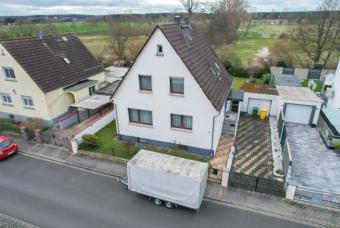 DIETZ: Modernisierungsbedürftiges Einfamilienhaus mit Garten in direkter Feldrandlage von Rollwald! Haus kaufen 63110 Rodgau Bild mittel