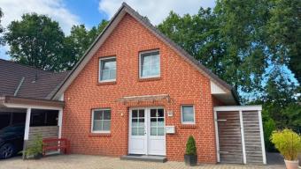 Doppelhaus mit Terrasse und Carport Haus kaufen 49843 Uelsen Bild mittel
