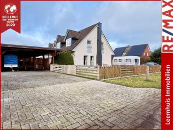 * Doppelhaushälfte * Heizung von 2023 * PV-Anlage von 2024 * Doppelcarport * Top Lage * Haus kaufen 26676 Barßel Bild mittel