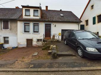 Einfamilienhaus in Gersheim – 140 m² Wohnfläche, vermietet & attraktive Kapitalanlage! Haus kaufen 66453 Gersheim Bild mittel