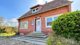 Einfamilienhaus mit Einliegerwohnung in Neuenhaus; + Baugrundstück-Potenzial Haus kaufen 49828 Neuenhaus Bild mittel