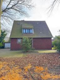 Einfamilienhaus mit großem Grundstück Haus kaufen 26802 Moormerland Bild mittel