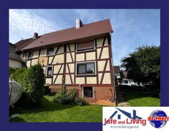Einfamilienhaus mit schönem Grundstück und Kaminofen Haus kaufen 36325 Feldatal Bild mittel