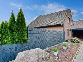 Einfamilienhaus mit Vollkeller, Doppelgarage und großem Grundstück in Tarmstedt Haus kaufen 27412 Tarmstedt Bild mittel