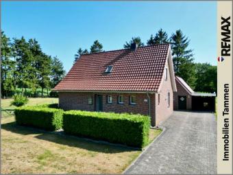 + Einmalige Alleinlage nahe Papenburg – gepflegtes Einfamilienhaus auf 1.839 m² Grundstück + Haus kaufen 26810 Westoverledingen Bild mittel