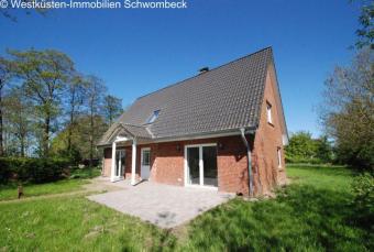 Elegantes Landhaus in Nordermeldorf - Exklusives Wohnen mit Sauna und Kamin Haus kaufen 25704 Nordermeldorf Bild mittel